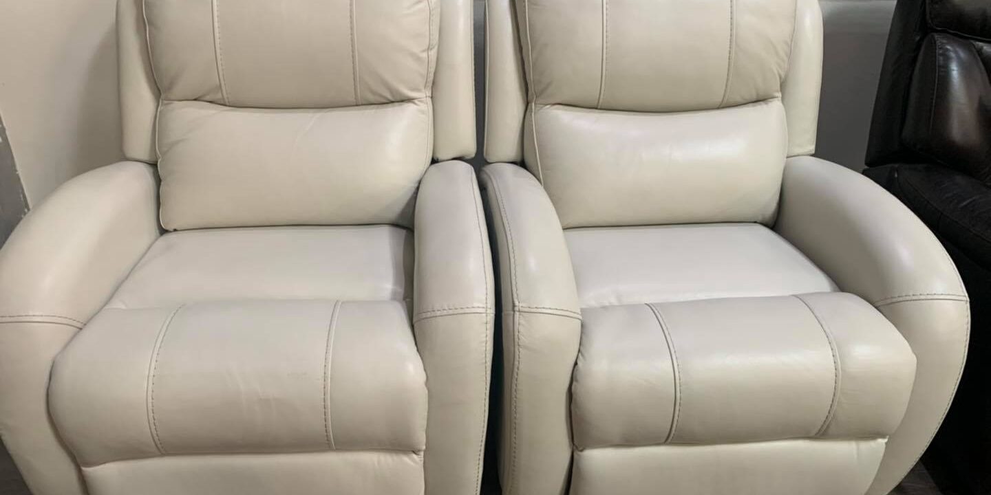 Two reclining leather arm chairs $799