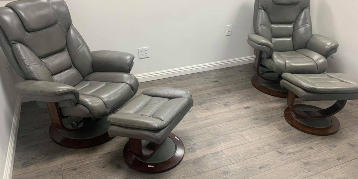 Leather arm chair and foot stool $299