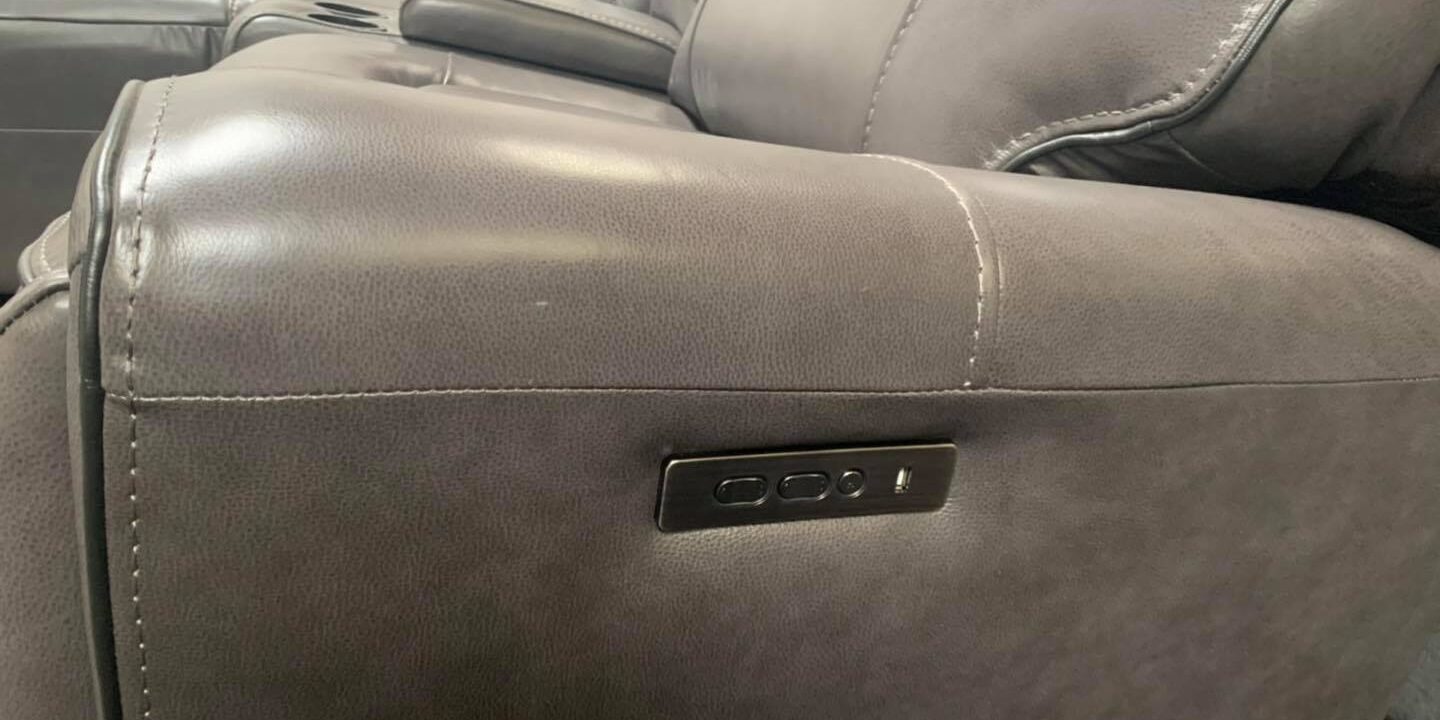 3 Piece Leather sectional couch with power recliner, power chaise, console and U