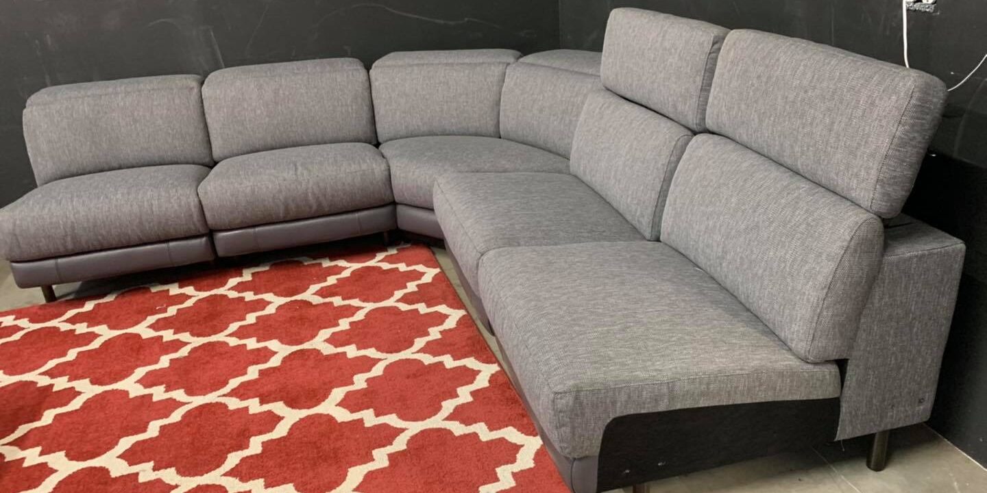 Madiana 5 Piece Fabric and Leather Sectional with adjustable headrests.  $599