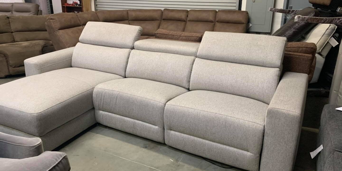 Nevio 3 piece fabric sectional couch with one power recliner, articulating headr