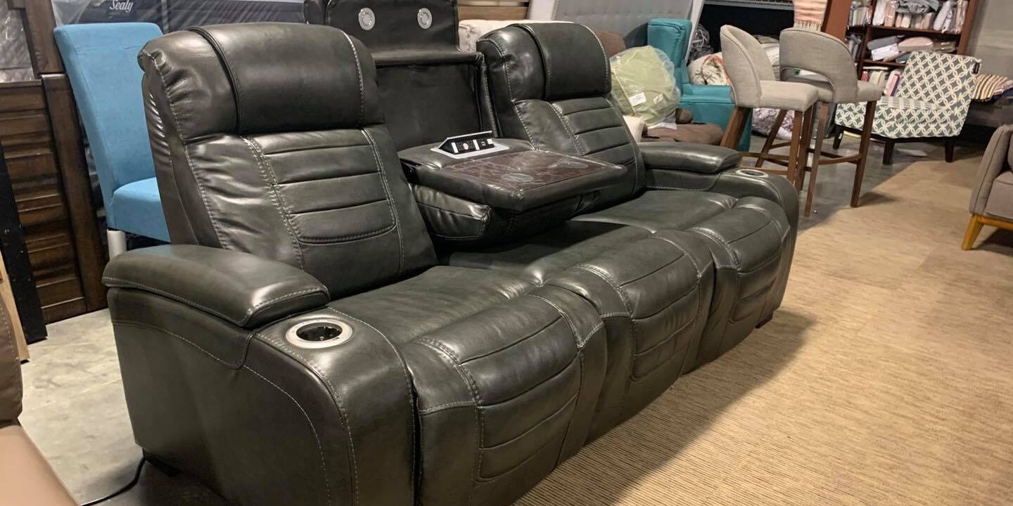 Top grain sofa with Two power recliners Power headrests Out let USB ports $899
