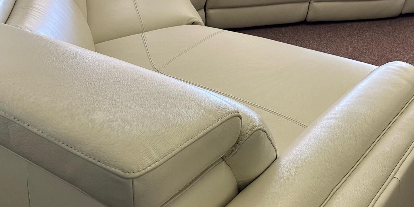 Jenneth 5 pc leather sectional with 2 power recliners & Cuddler  $2,299